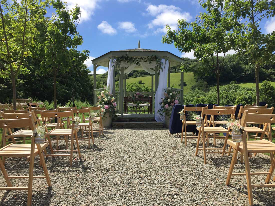 Outdoor wedding ceremony at Pengenna Manor
